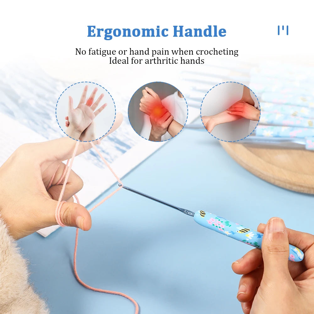 Hands are using an ergonomic crochet hook with a blue bee design for crafting.