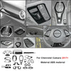 A collection of carbon fiber interior trim pieces and components for a Chevrolet Camaro 2017+ vehicle.