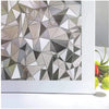 Close-up of frosted stripe privacy window film with a geometric, faceted pattern.