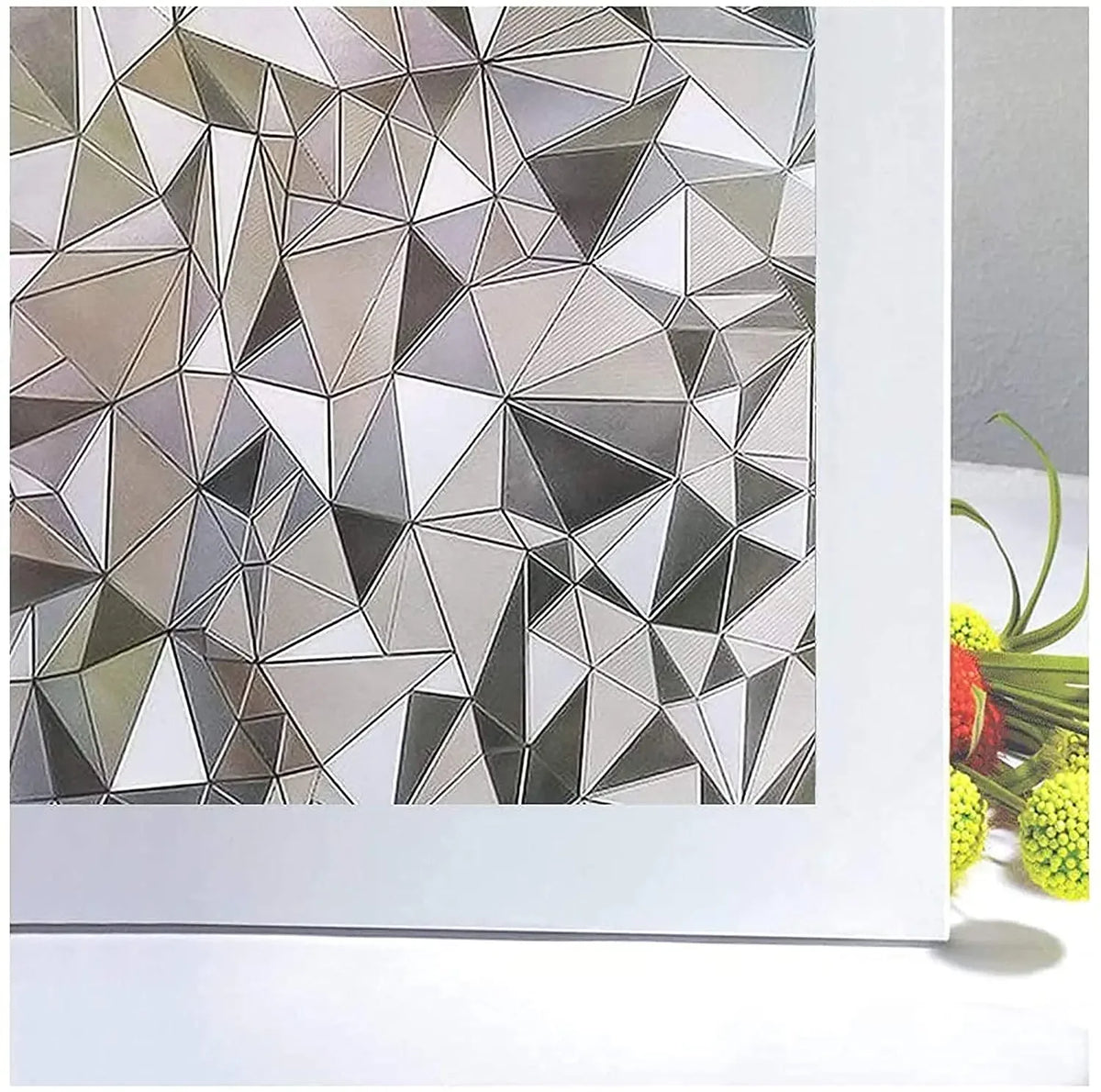 Close-up of frosted stripe privacy window film with a geometric, faceted pattern.