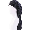 Black satin sleep bonnet with an adjustable tie displayed on a white mannequin head.