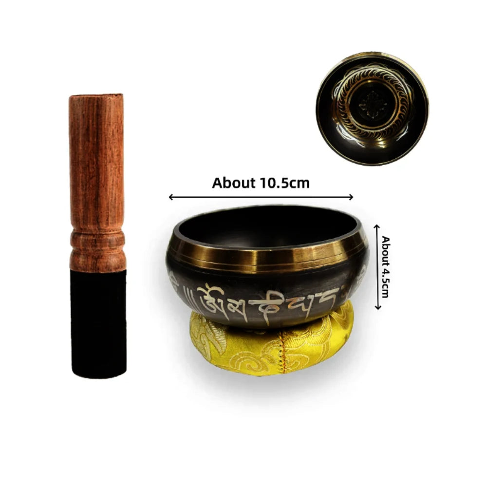 Handcrafted Tibetan singing bowl with a black cushion and striker, shown next to its disassembled parts.