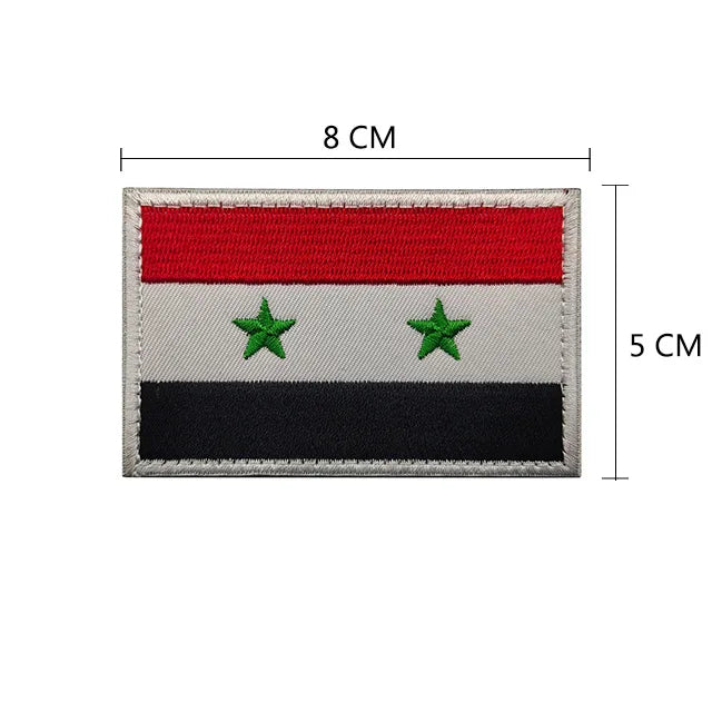 Rectangular embroidered flag patch with horizontal stripes of red, white, and black, featuring two green stars.