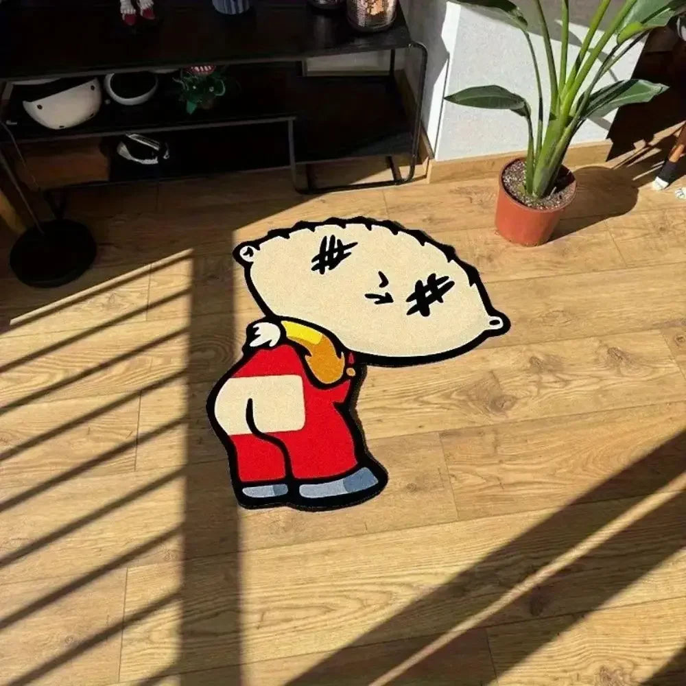 A plush cartoon character resembling a bald figure in a red outfit is placed on a wooden floor.
