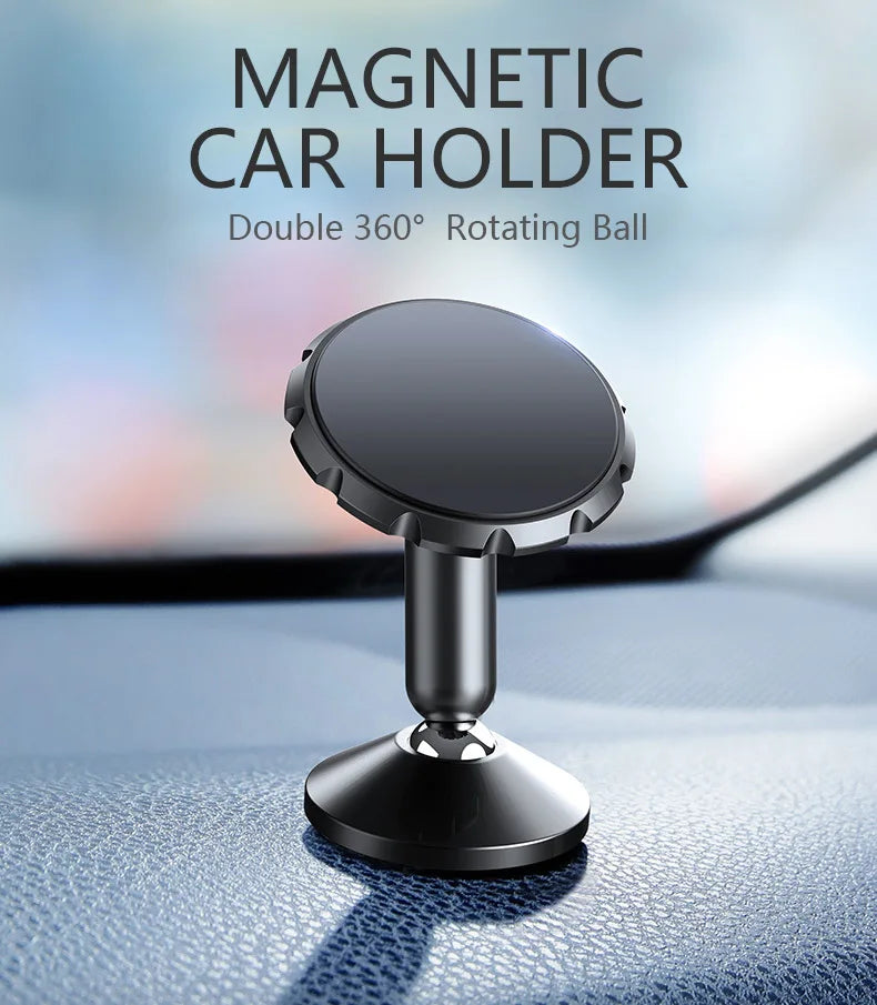 A black magnetic car holder with a double 360 degree rotating ball mounted on a car dashboard.