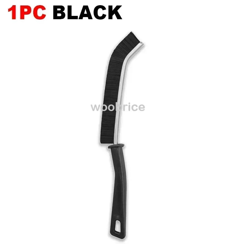 A black multifunctional crevice cleaning brush set.