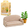 A brown plaid fabric sofa set from Sylvanian Families Forest Friends featuring a sofa and accompanying accessories.