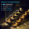 LED step lights illuminate an outdoor staircase with warm white light.