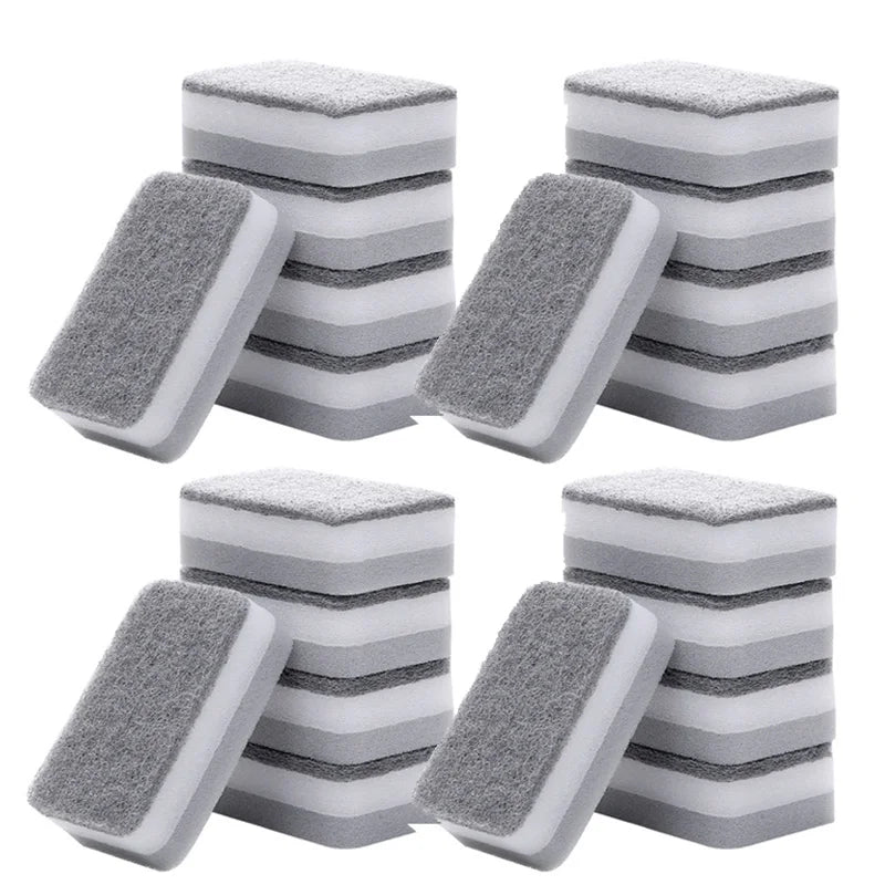 A set of gray and white double-sided cleaning sponges stacked in groups.