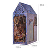 A miniature wooden puzzle book shelf insert decor shaped like a gothic house with a pitched roof and arched window.