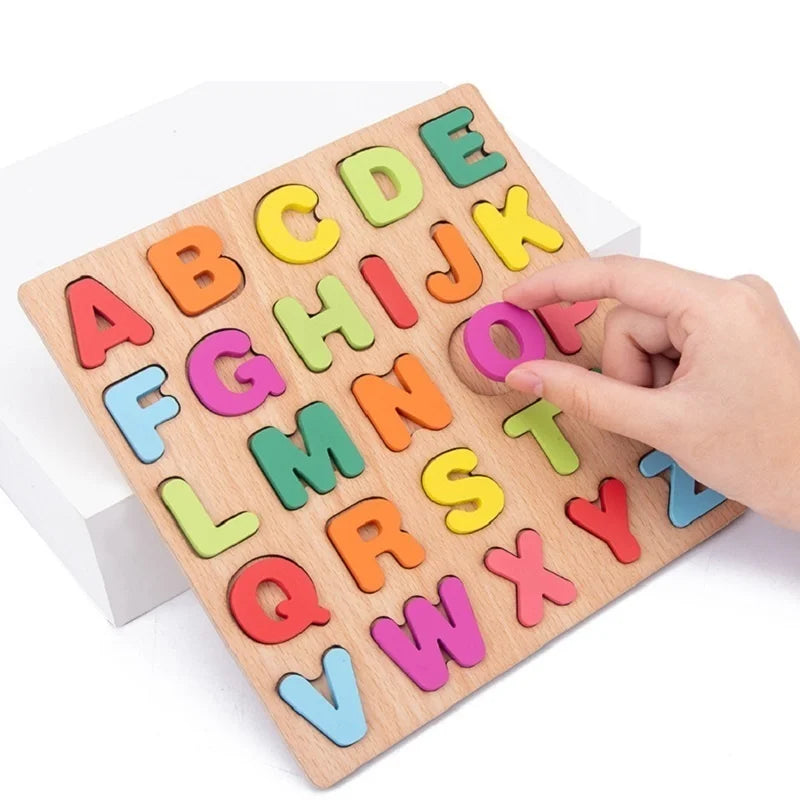 A wooden alphabet puzzle board with colorful letters and shapes being handled by a hand.