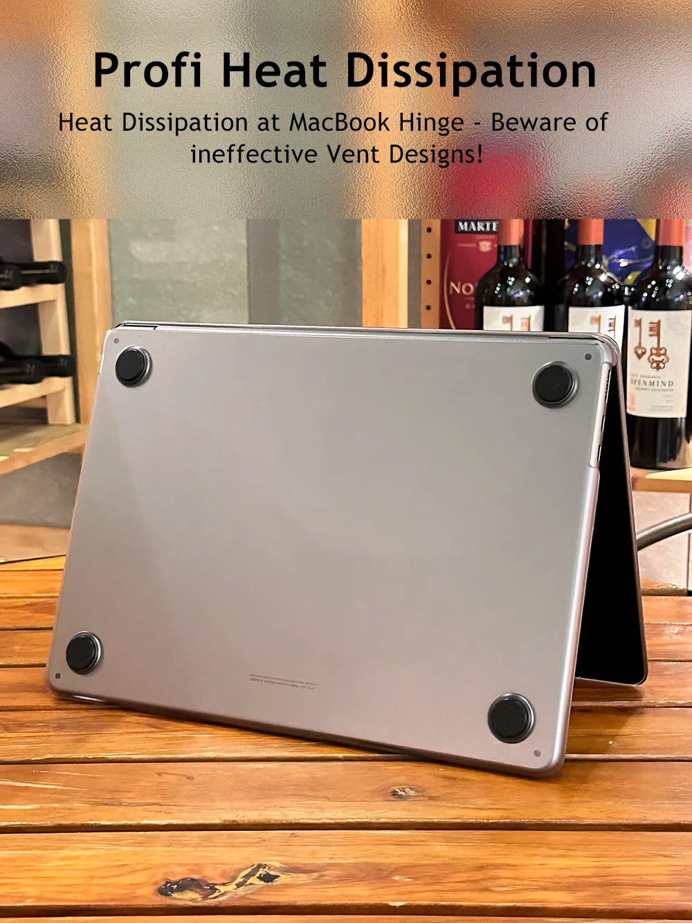 A silver MacBook is shown on a wooden table, illustrating proper heat dissipation design.
