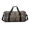 A leopard print travel tote bag with black handles and a shoe compartment.
