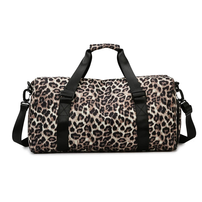 A leopard print travel tote bag with black handles and a shoe compartment.