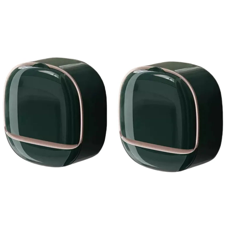 A dark green waterproof hanging soap holder with a metallic trim, shown from above.