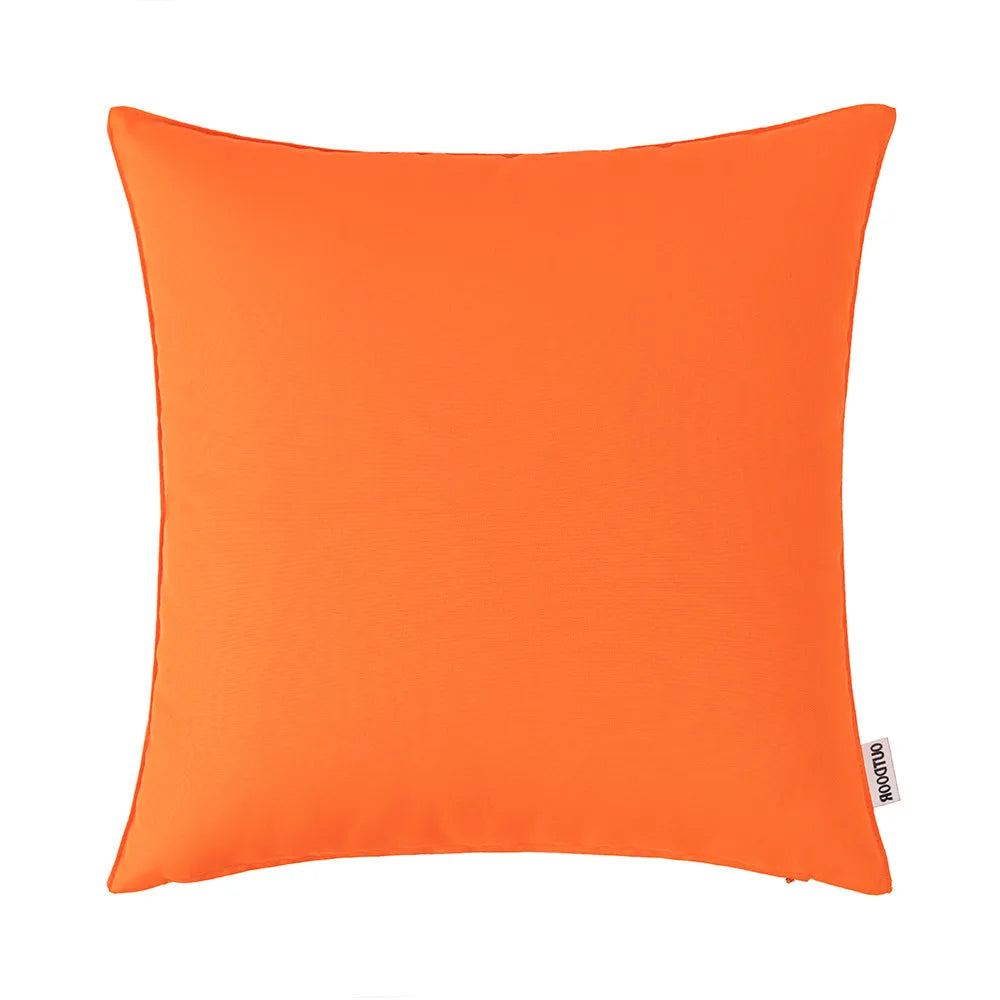 A bright orange linen-textured pillow cover for outdoor use.