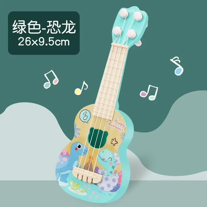 A light blue ukulele toy guitar with a dinosaur theme is shown against a green background.