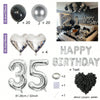 Partyballon-Dekorationen-Set mit silbernen und schwarzen Ballons, herzförmigen Folienballons und Zahlenballons.