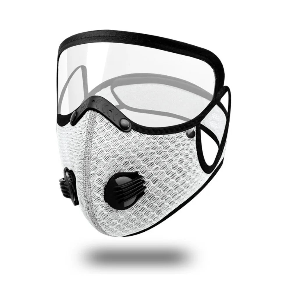 A clear reusable cycling face mask with a black frame and mesh filter.