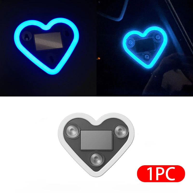 A heart-shaped LED light fixture with a rectangular panel, shown in blue and white versions.