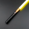 A close-up of an RGB heavy dueling lightsaber with a metal hilt and glowing yellow blade against a dark background.