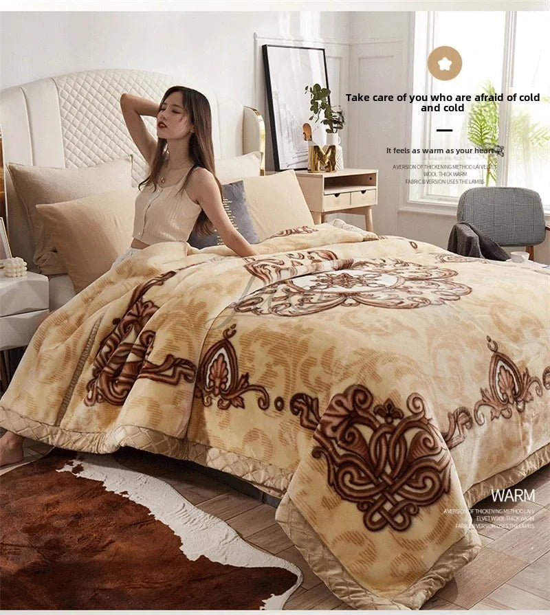 A beige weighted plush blanket is displayed on a bed, with a woman sitting beside it in a bright bedroom setting.