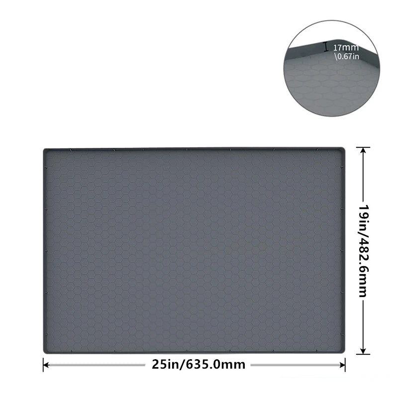 A rectangular gray silicone mat for under-sink use with a raised edge and dimensions of 25in by 19in.