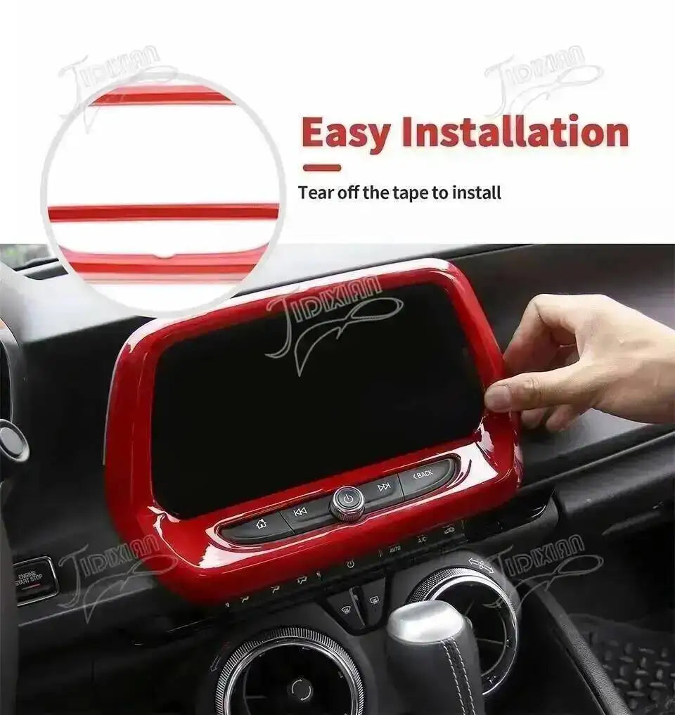 A close-up of a red interior trim kit being installed in a car dashboard, showing a tape being torn off for easy installation