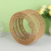 A woven paper rope pendant lampshade in natural brown color displayed against a light green background.