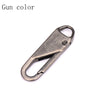 A close-up view of a metal zipper pull or slider repair component.