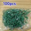 A clear plastic bag containing 100 reusable green plant clips for garden support and vine fixing.