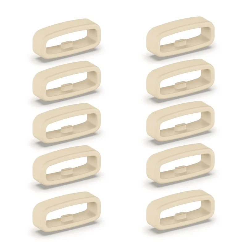 A set of ten beige silicone watch strap retainers shown in various angles.