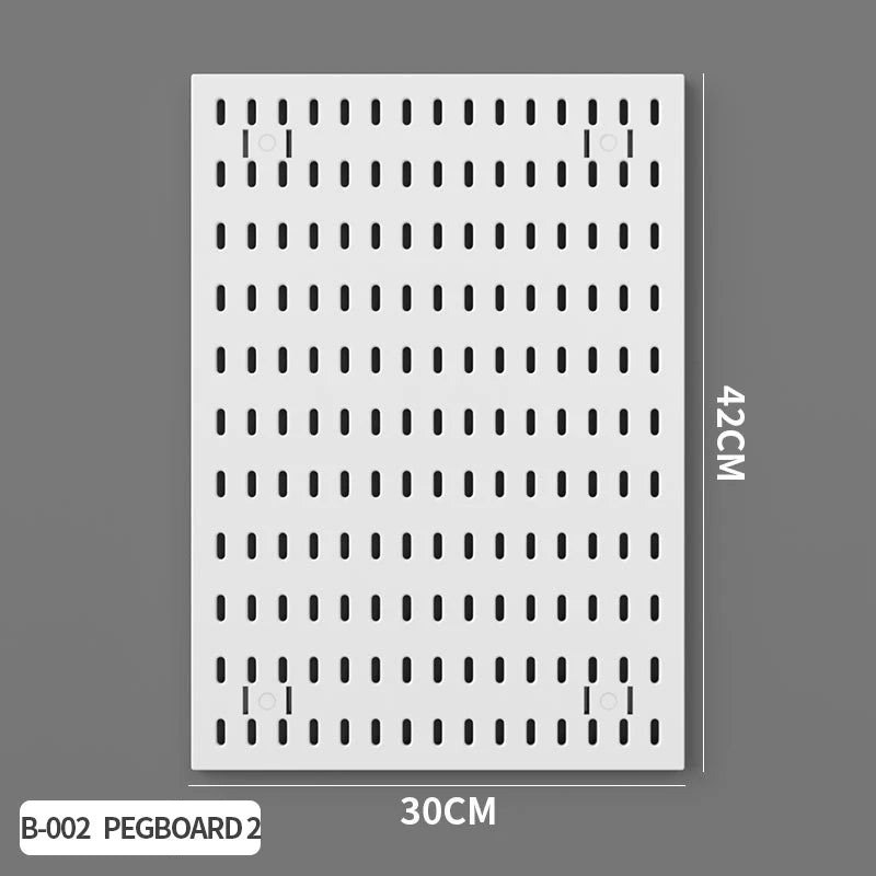 A white pegboard organizer board with numerous holes for hanging items and small shelves.