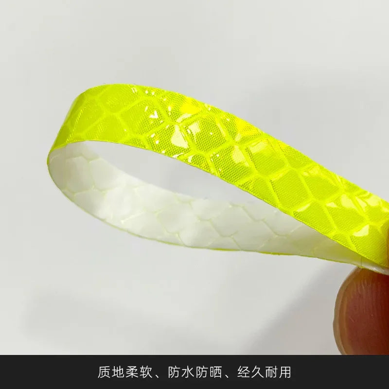 Yellow and white reflective wheel rim strips for automotive use