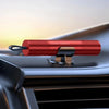 A red safety hammer tool is shown resting on a car interior surface.