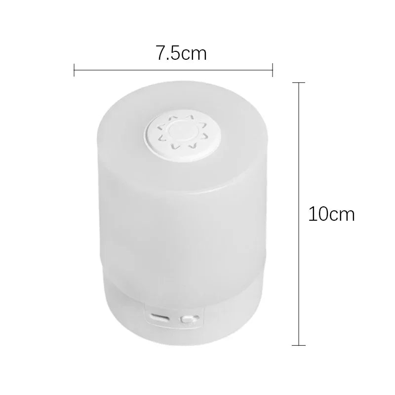A white touch dimmable LED table lamp with a warm glow, shown from the side.