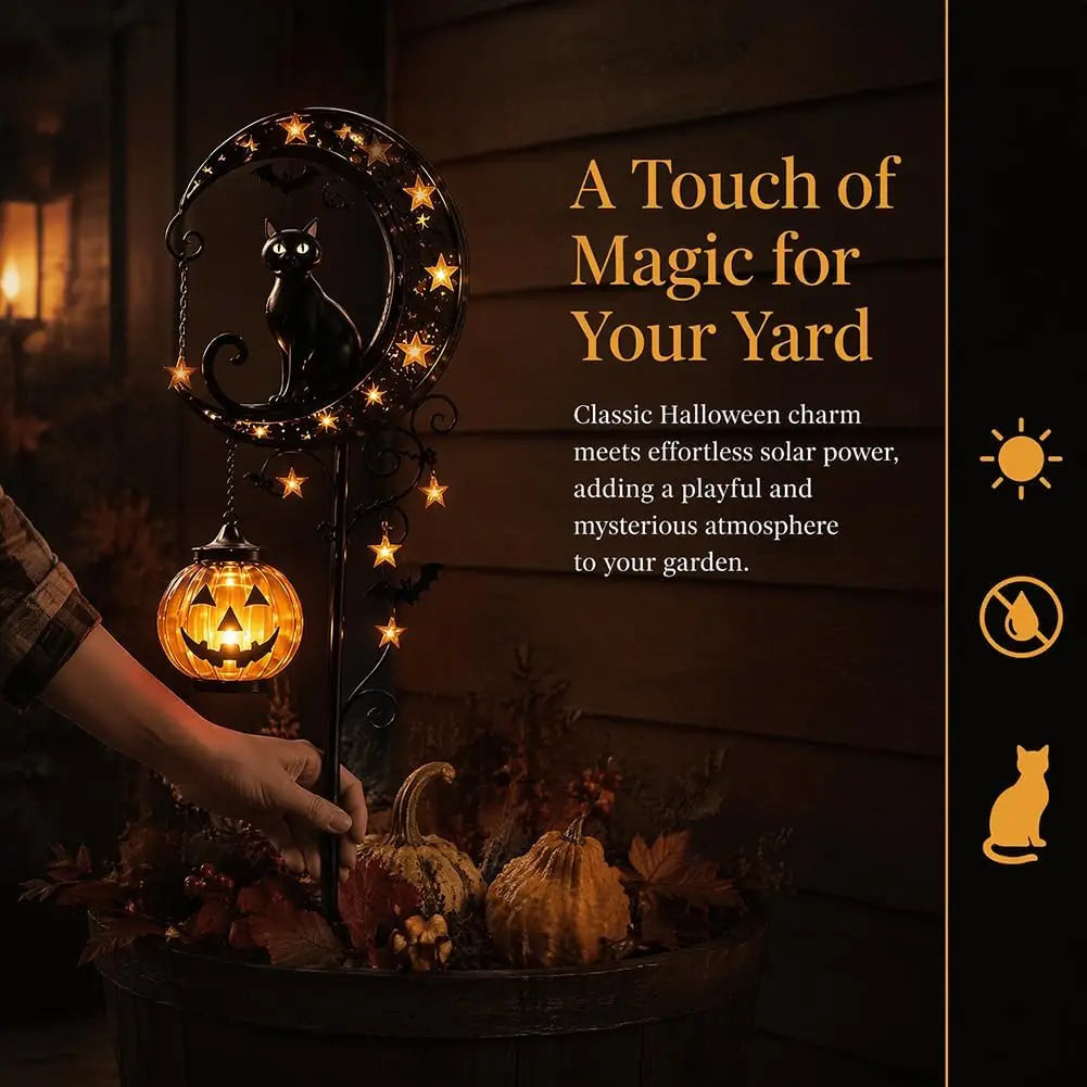 A black cat silhouette and pumpkin decoration on a stake light for Halloween garden decor