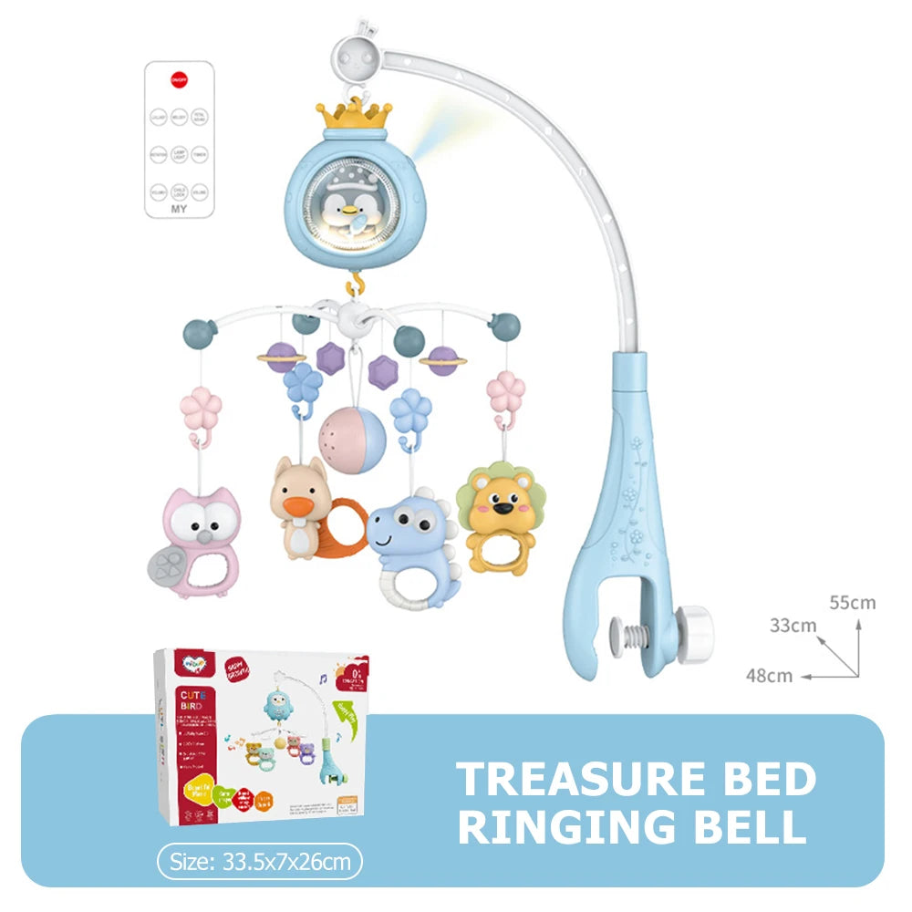 A treasure bed ringing bell mobile featuring a crown, various hanging toys, and a light fixture.