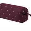 A maroon quilted storage bag for a portable hair dryer and styling tool.