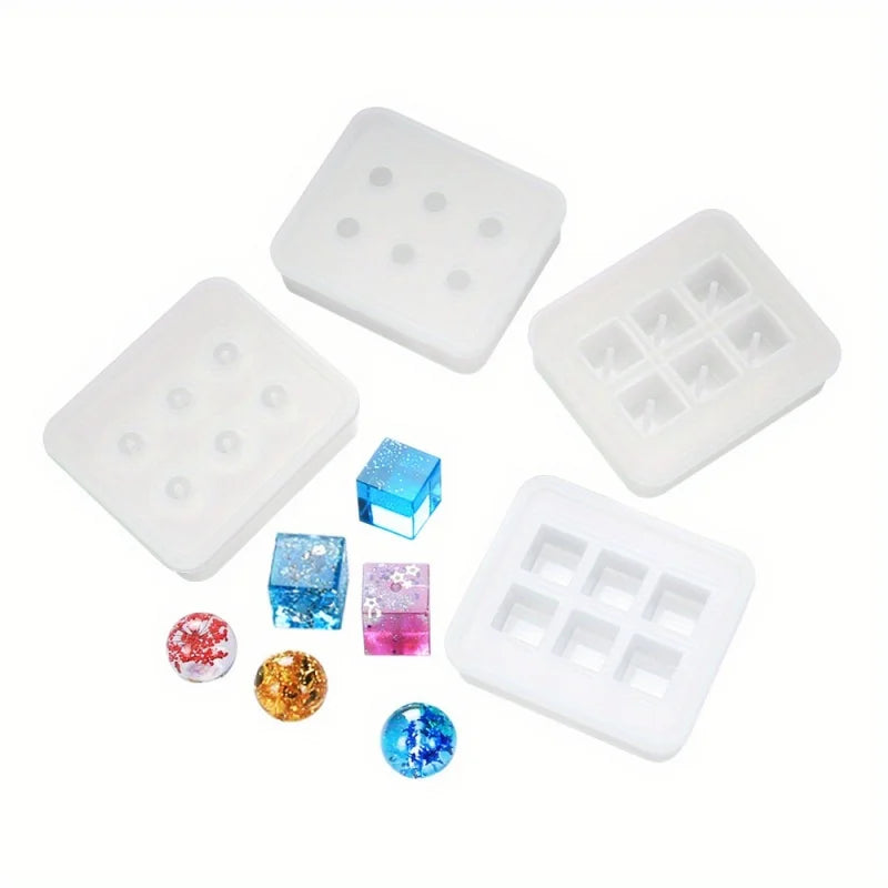 White silicone molds with various colored beads and stones for DIY jewelry making