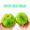 Two bright green kiwi slush squishy balls held in a person's hand