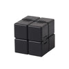 A black Infinity Cube fidget toy with multiple interlocking cubes.
