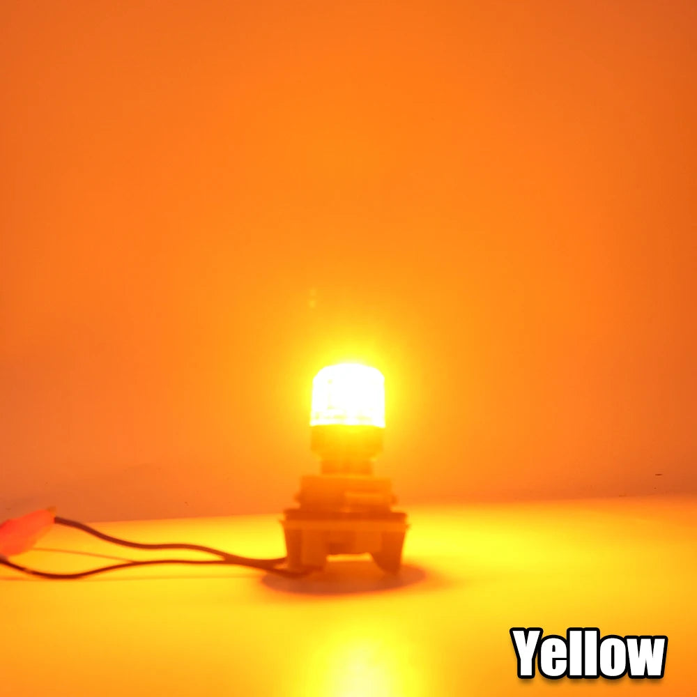 A yellow LED bulb is shown with a wire, illuminated against an orange background.