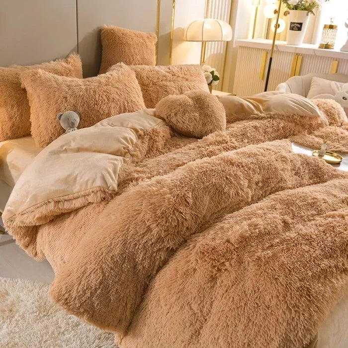 A luxurious beige plush mink velvet duvet cover set with sheets displayed on a bed.