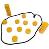 A collection of yellow magnetic stones stacked in a pyramid shape on a white cloth board.