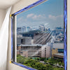 A window featuring a blue electric lightning effect border and a mesh screen for mosquito protection.