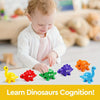 A toddler is interacting with a colorful dinosaur letter and number matching game set.