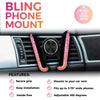 A pink bling phone mount is shown installed in a car air vent, featuring a secure grip and adjustable angle.