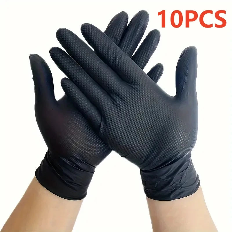 A pair of black heavy-duty nitrile disposable gloves with a diamond texture shown on a hand.