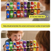 A game board with colorful bottles used for a memory match guessing game.
